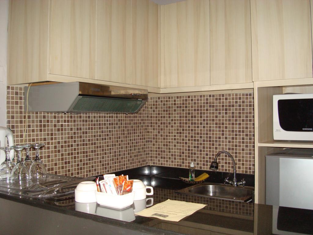 Ap Suite Apartment Кута Экстерьер фото